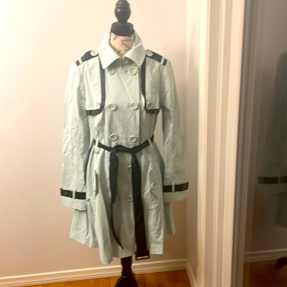 Sugarfly soft light green trench coat with black faux leather accents.
